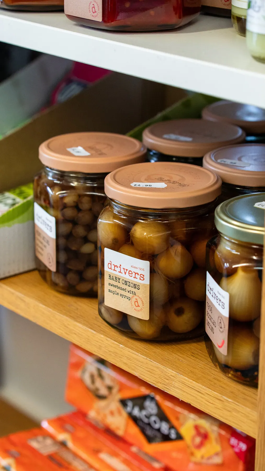 Independent deli shelves photographed for a Leicester business
